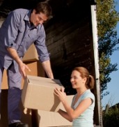 Woman assist with loading boxes